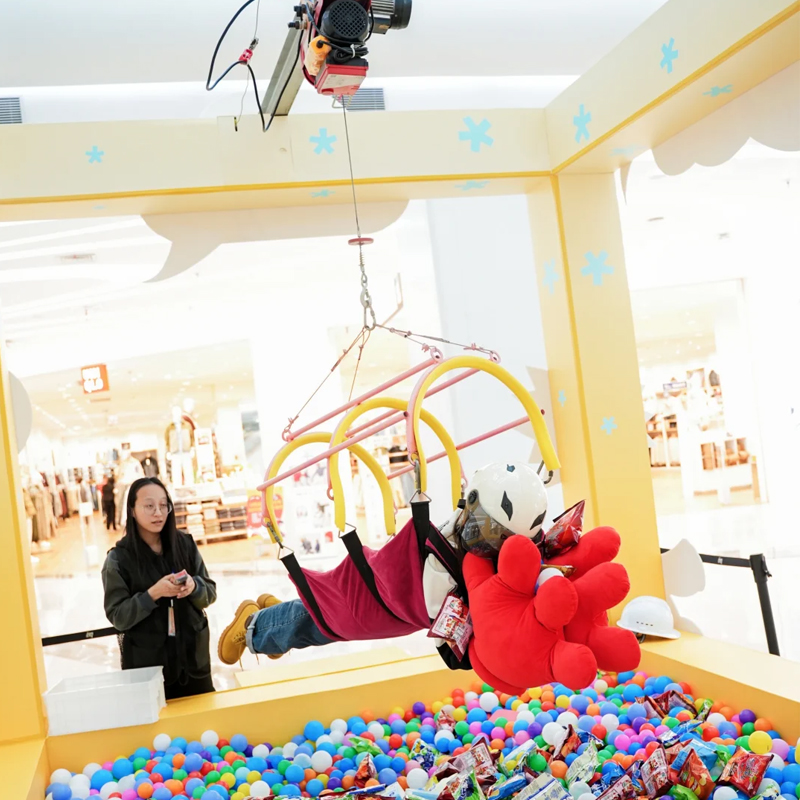 Dedicated interactive zone featuring the BLEE Real-Life Claw Machine as a flagship attraction.