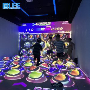 Motion sensing ball game with wall and floor projection