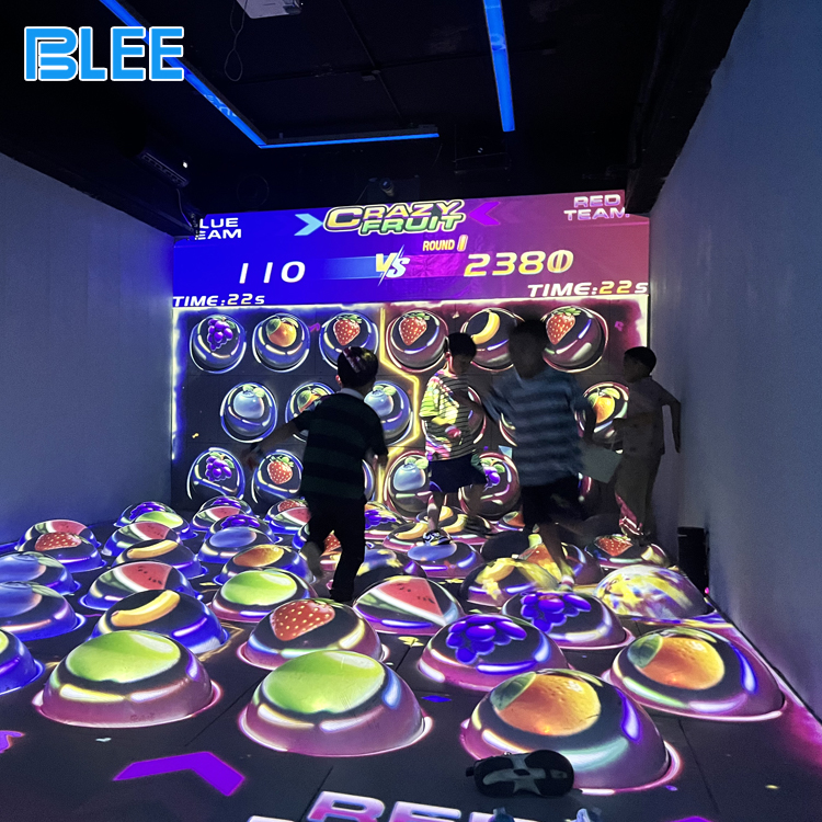 Motion sensing ball game with wall and floor projection Motion sensing ball game with wall and floor projection